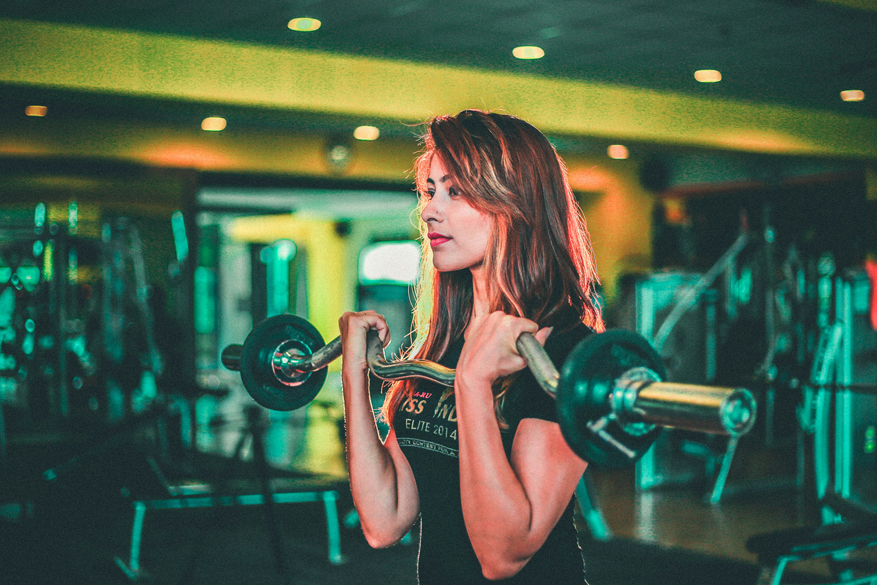 A woman is lifting weights